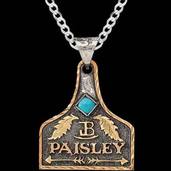 Meet our Milie Cow Tag Necklace featuring a hand matted German Silver base with classic antique finish, adorned with Jeweler's Bronze hand-engraved feathers and arrows. Customize it with your ranch brand or logo!